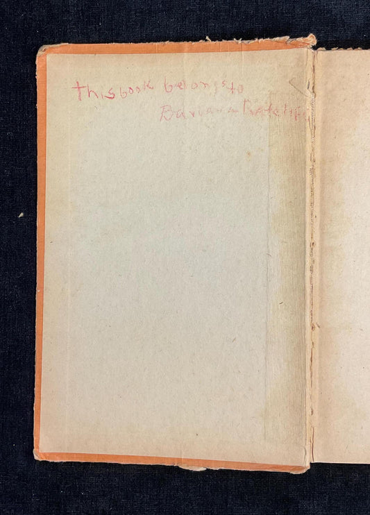 Open book with aged pages on a dark background