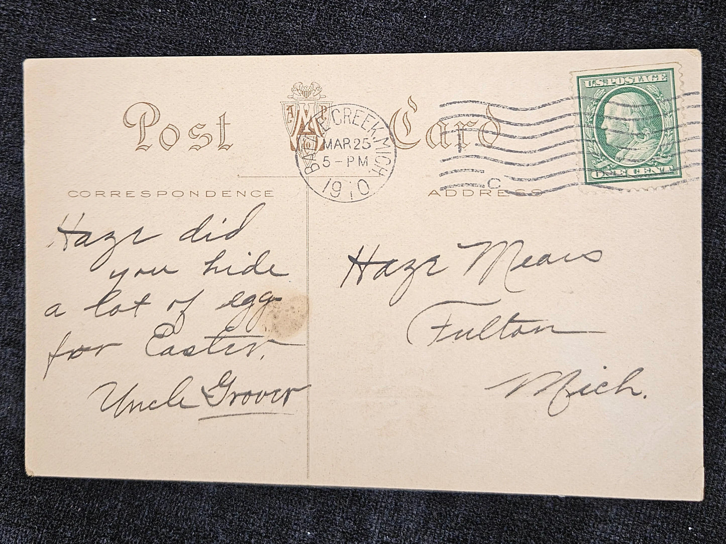 Vintage letter with postage stamp and postmarks on a dark background