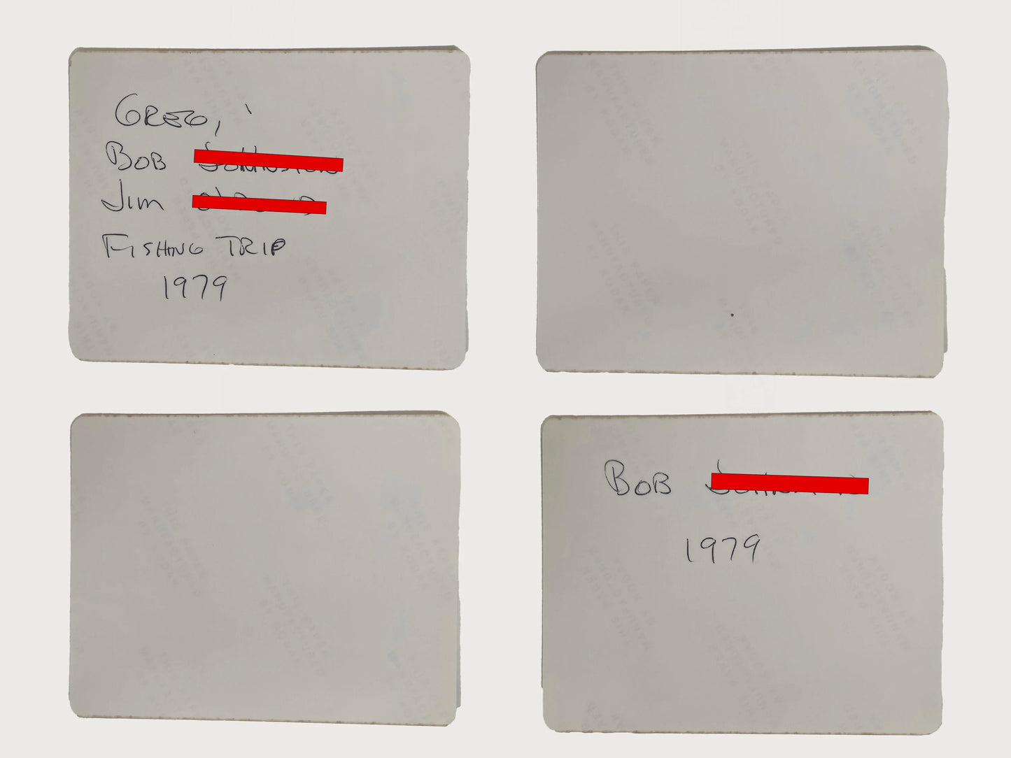 Backs of four vintage photos of men on a fishing boat
