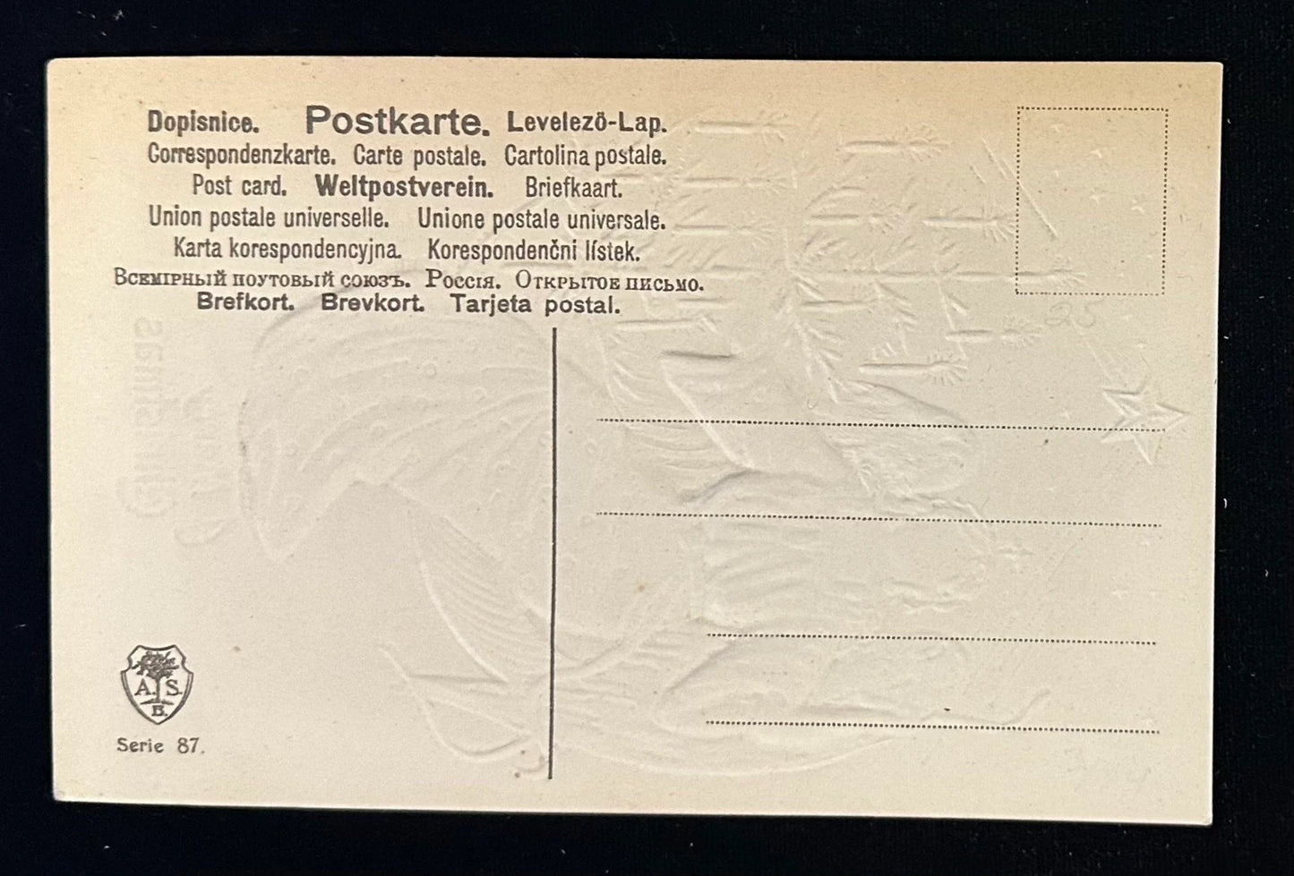 Back of a vintage postcard with text and a logo on a beige background