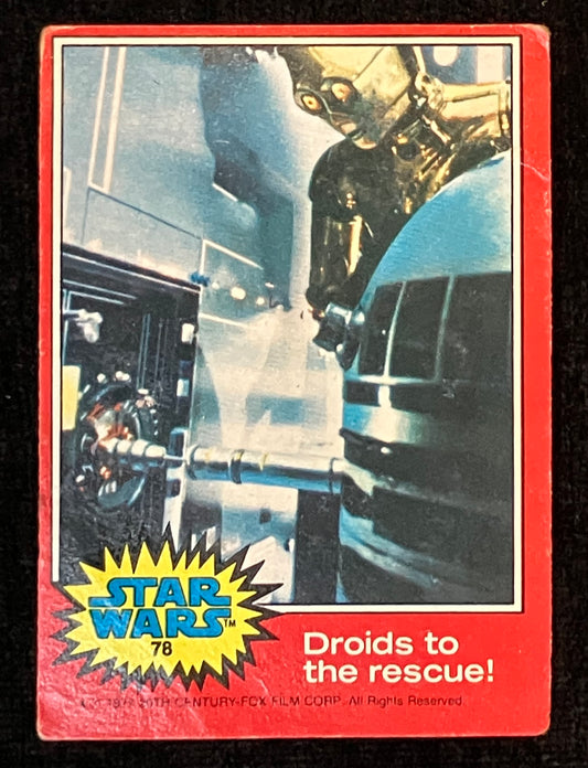 Vintage Star Wars trading card featuring C3-PO and R2-D2, with a red border and 'Star Wars' logo.