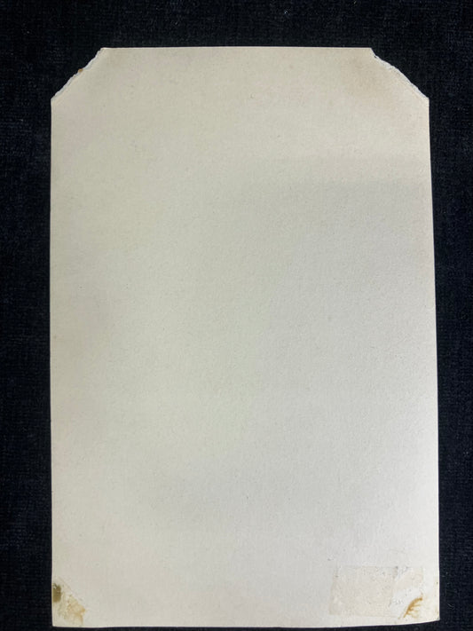 White rectangular card on a black background