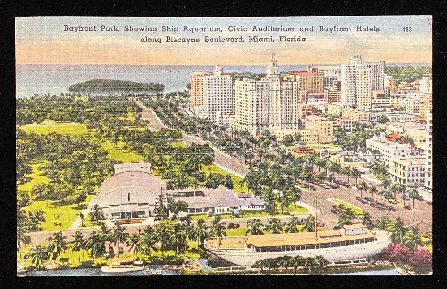 Bayfront Park - Showing Ship Aquarium - Civic Auditorium and Bayfront Hotels along Biscayne Boulevard - Miami, Florida - Vintage Postcard