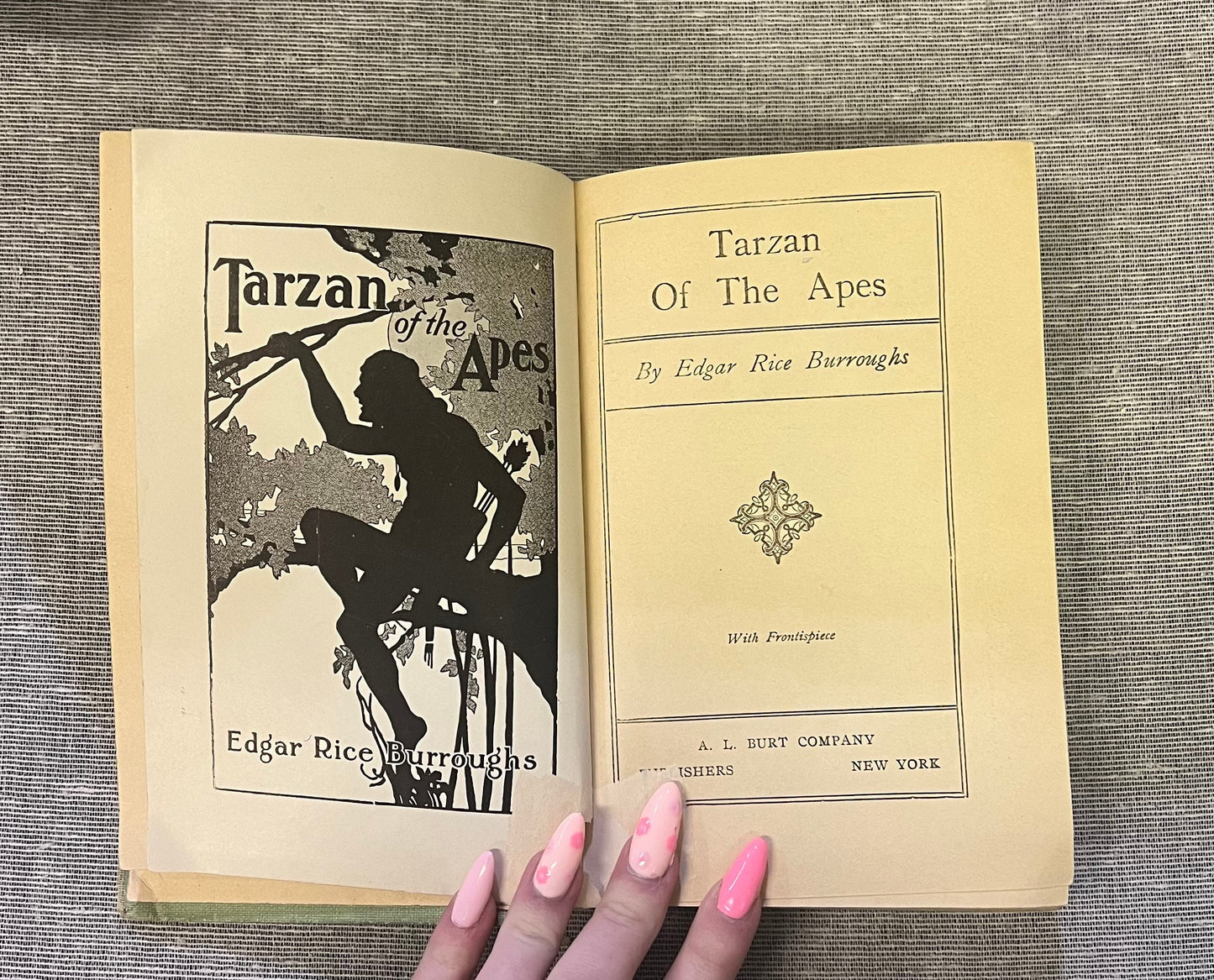 Tarzan of the Apes by Edgar Rice Burrows - Published June 1914, A.L Burt Co. Copyright A.C. McClurg & Co. -With Frontpiece