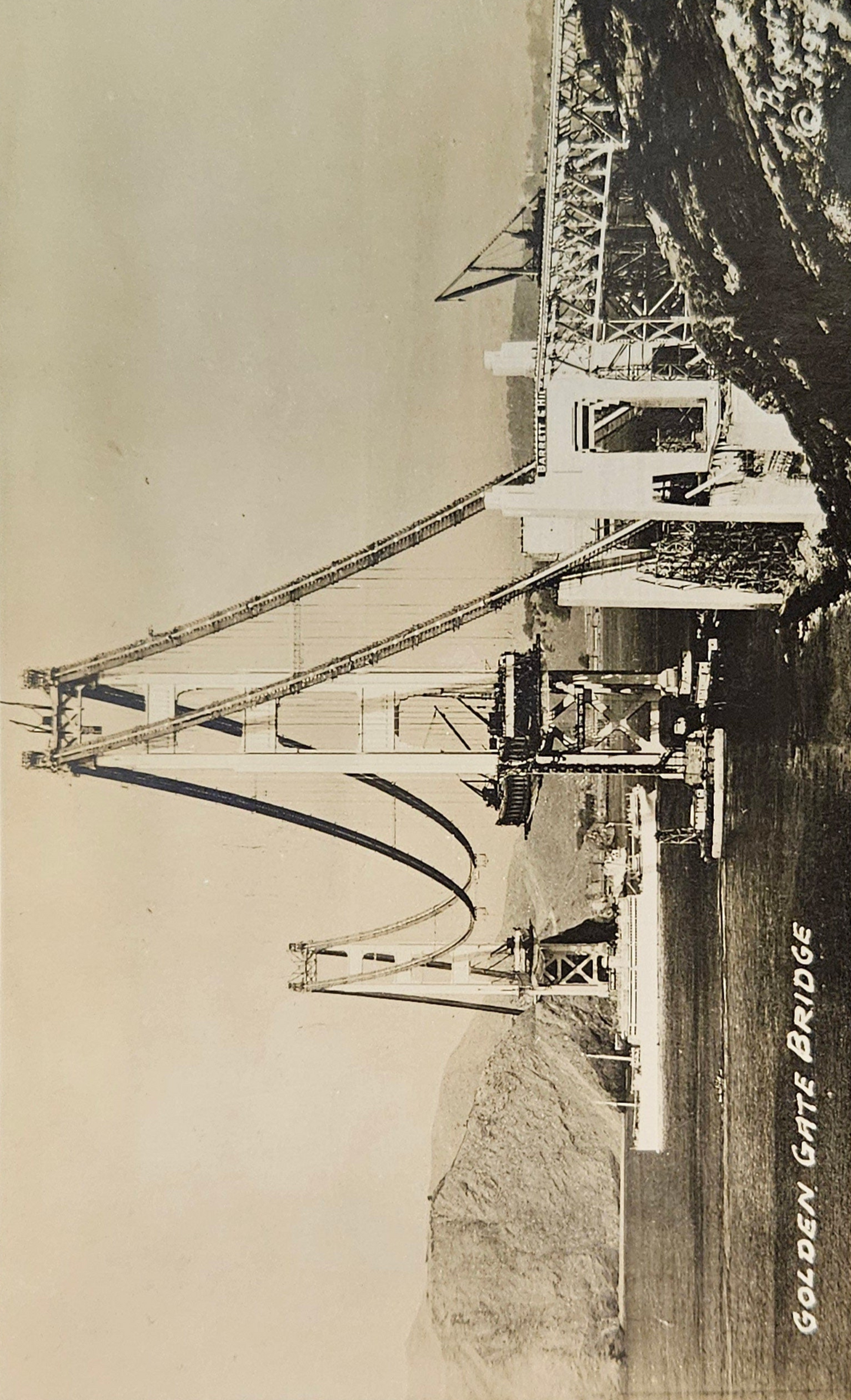 RPPC - Golden Gate Bridge Under Construction - 1935 Postcard Black/ White Photo - Bridge Construction Photo - Naval Ship Passing under Bridge