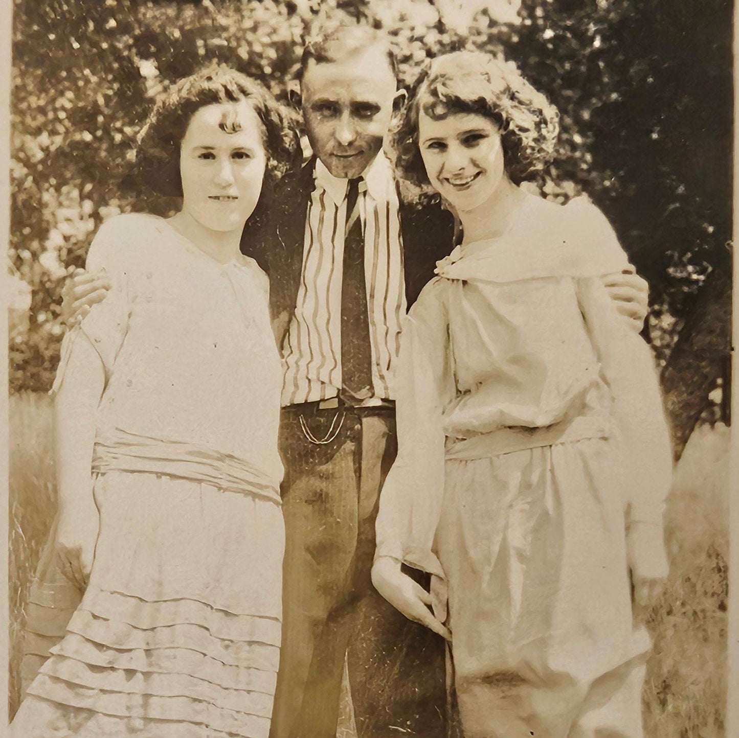 Photo of a Man and Two girls - Smiling, about 1905 - Siblings in Spring - Father and Daughters - Sepia Tone Photograph