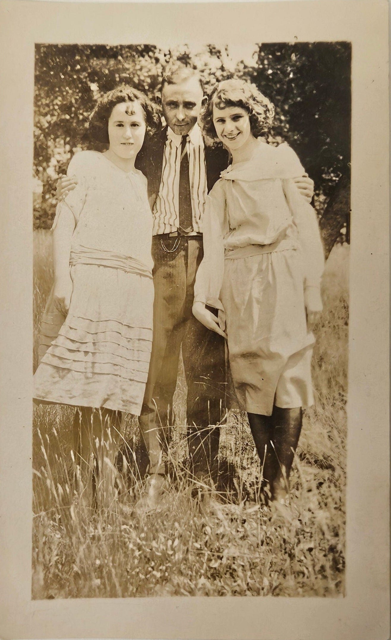 Photo of a Man and Two girls - Smiling, about 1905 - Siblings in Spring - Father and Daughters - Sepia Tone Photograph