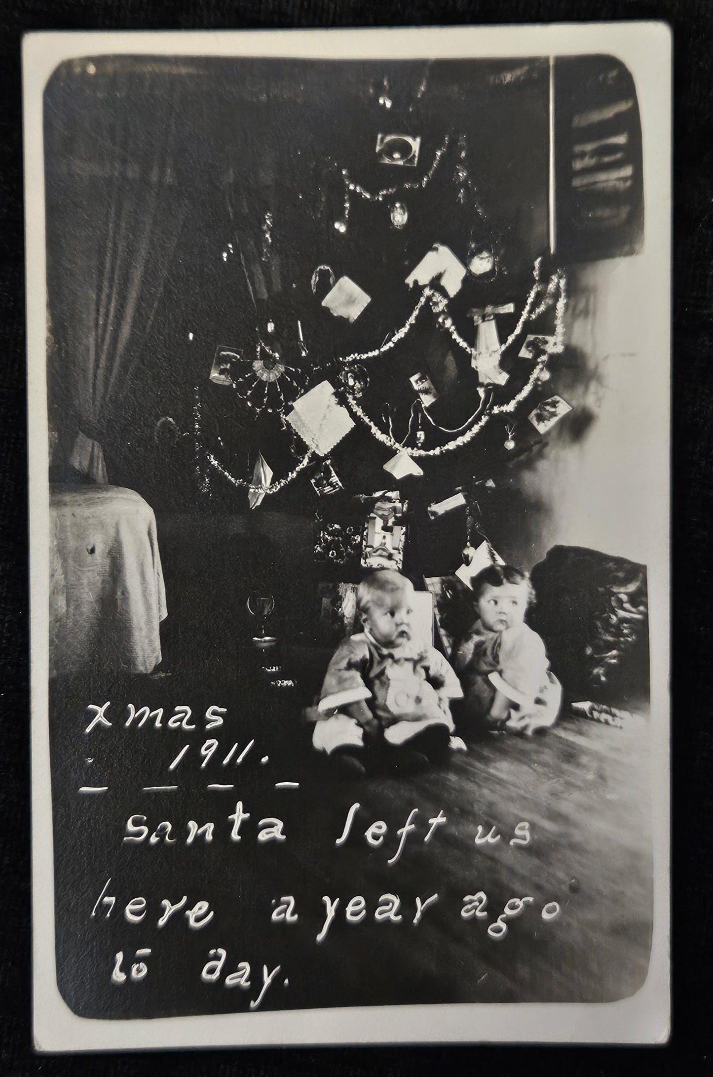 RPPC - 1911 Christmas Tree with Babies - "Xmas 1911 Santa left us here a year ago today" - The Twins First Birthday under Fancy Decorated Tree