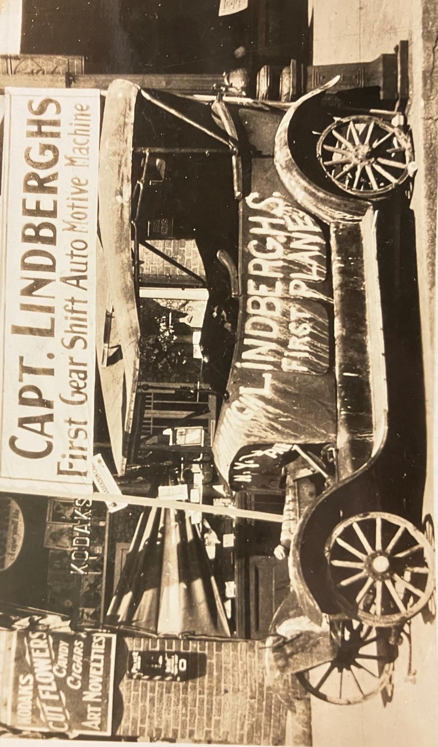 RPPC - Capt. Lindberghs First Gear Shift Auto Motive Machine - Kodak's Storefront in Background - Lindenberg's First Plane, Little Falls, Minnesota