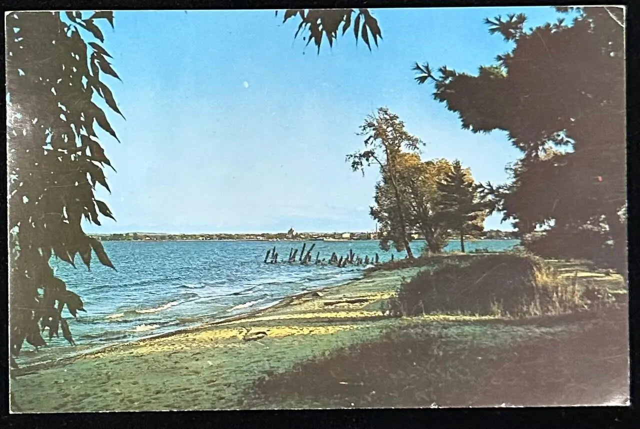 West Arm of Grand Traverse Bay with Traverse City on the Skyline, Michigan - Vintage Postcard