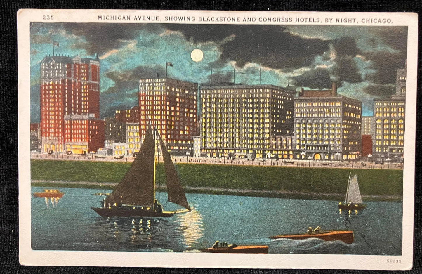 Michigan Avenue, Showing Blacstone and Congress Hotels, by Night Chicago, Illinois - Vintage Hotel Postcard