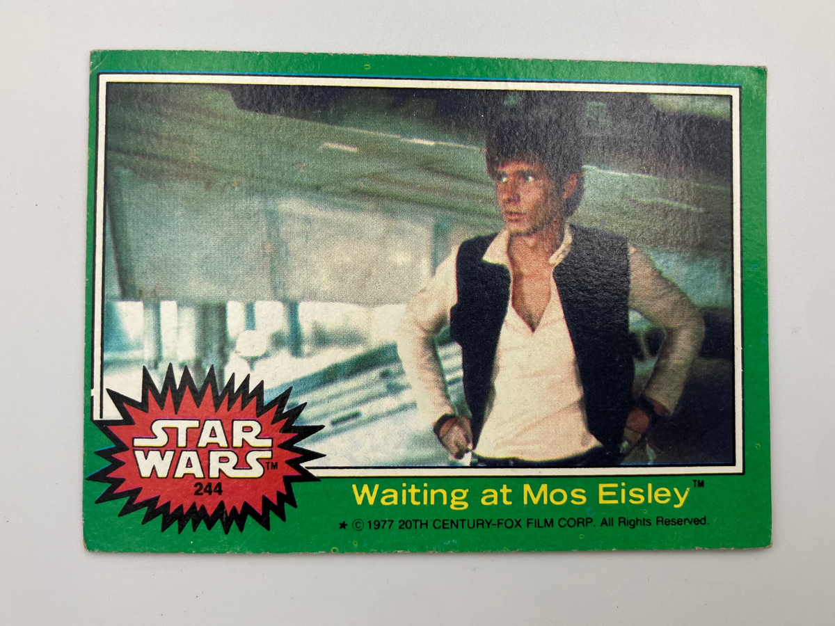 Vintage Star Wars trading card featuring Han Solo waiting at Mos Eisley.