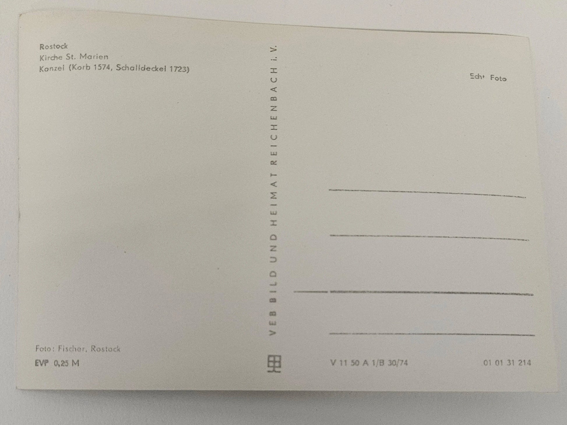 Back of a postcard with text and design elements on a white background