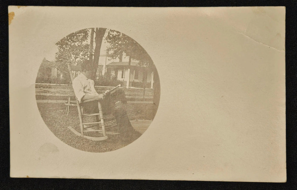 RPPC Young Man Sitting Outdoors dressed in White Shirt In Rocking Chair Reading 1913 - Vintage Postc