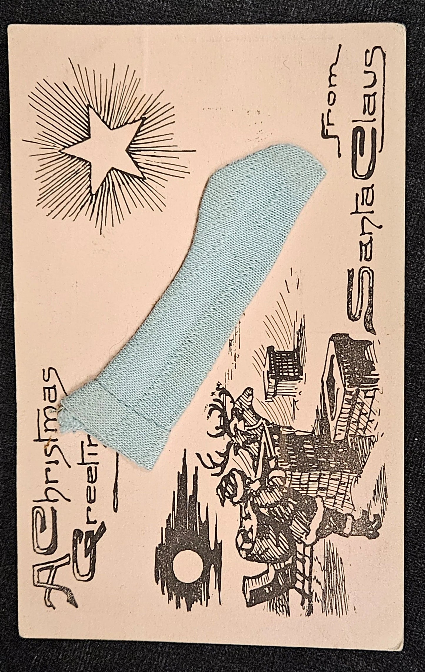 Vintage-style Christmas card with Santa Claus illustration and a blue sock on a dark background