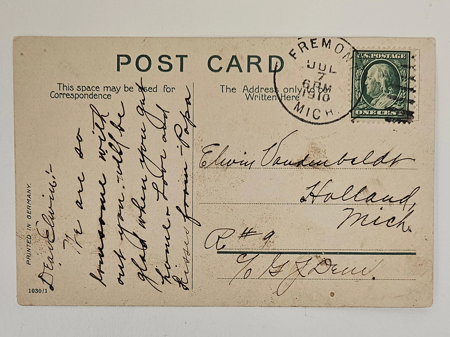 Vintage postcard with text and postage stamp, mailed from Fremont, Michigan.