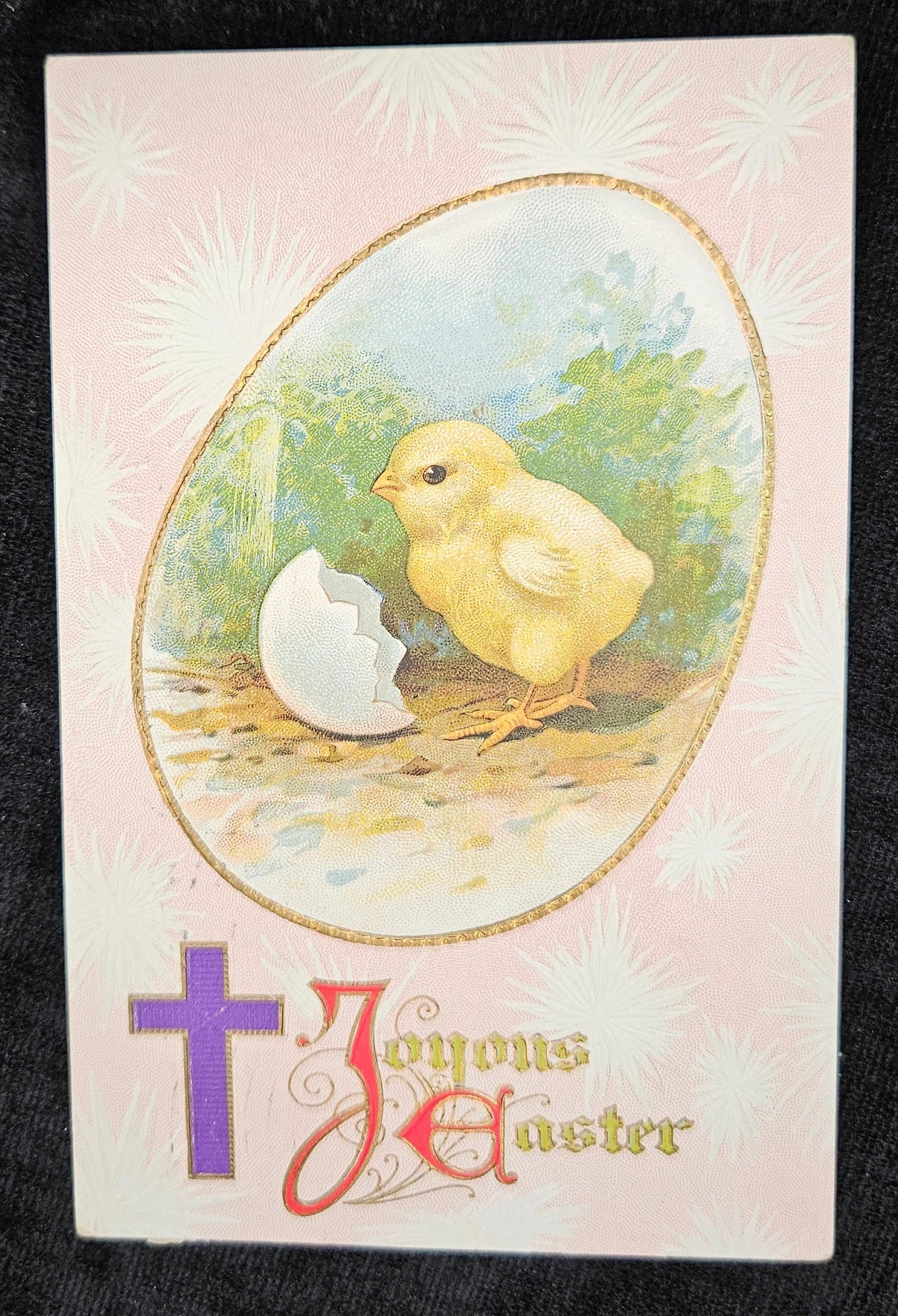 Vintage Easter card with chick and egg design on a black background
