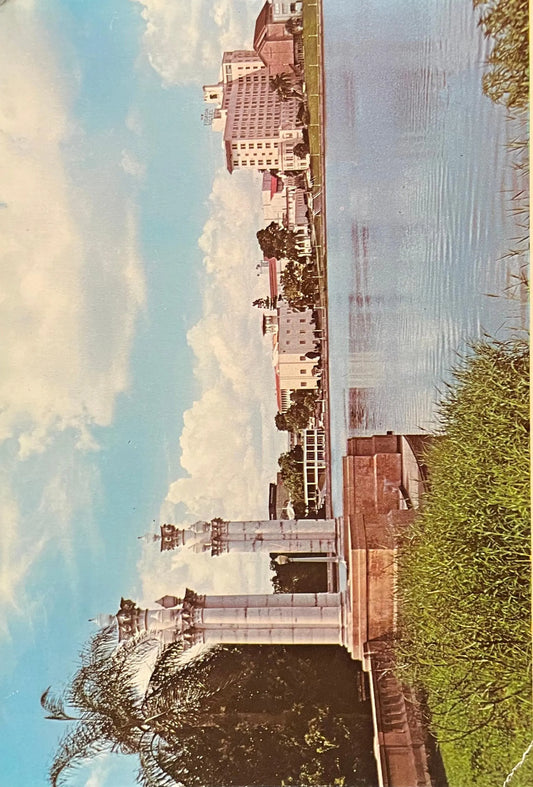 Lakeland, Florida- Skyline Of World's Citrus Center Across Lake Mirror