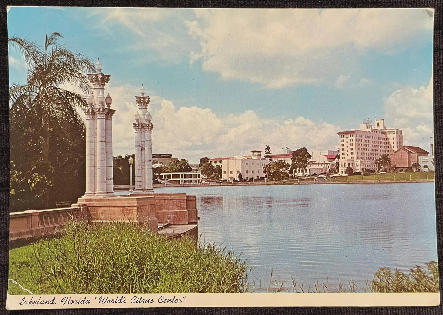 Lakeland, Florida- Skyline Of World's Citrus Center Across Lake Mirror