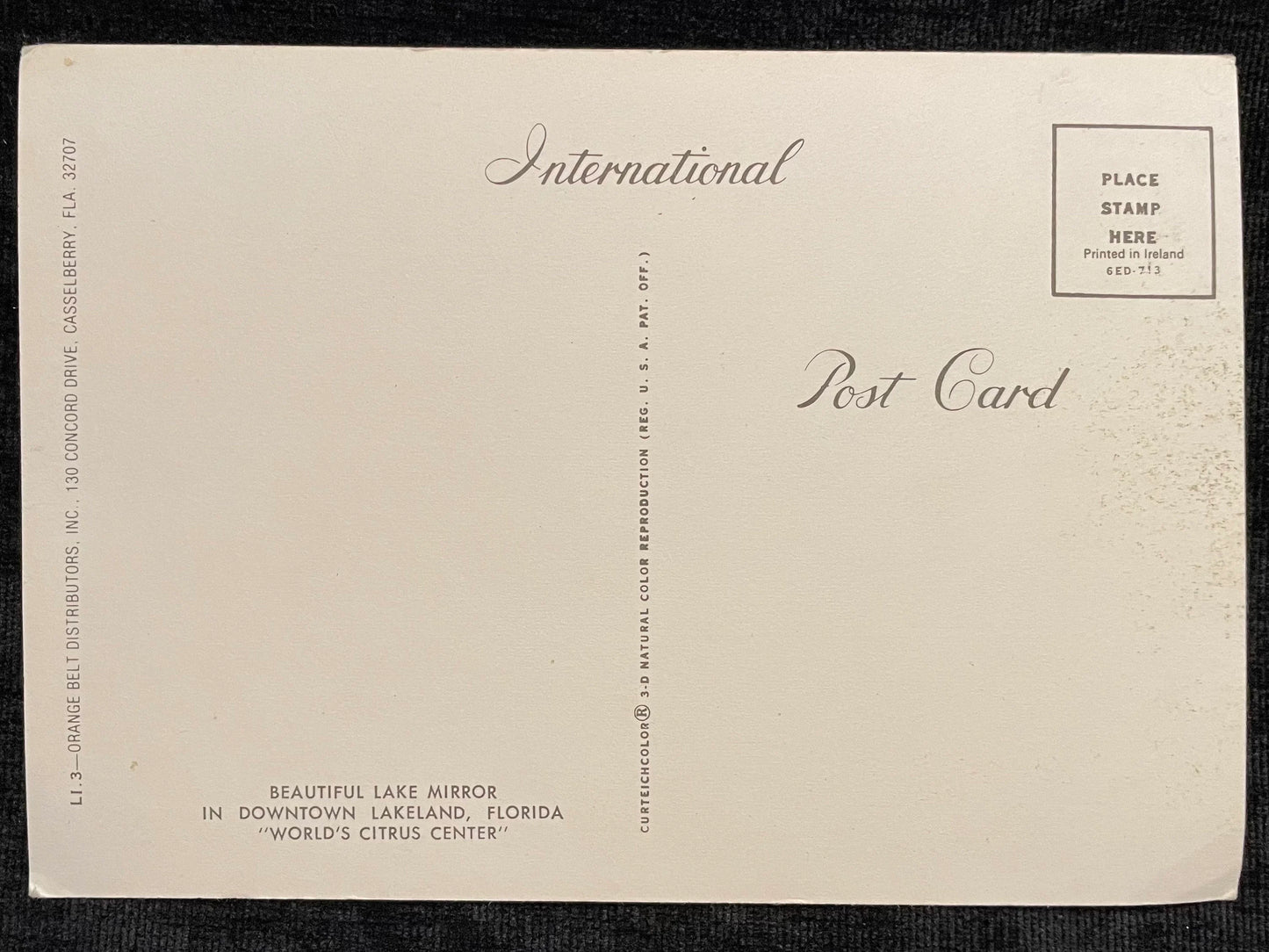 Lakeland, Florida- Skyline Of World's Citrus Center Across Lake Mirror