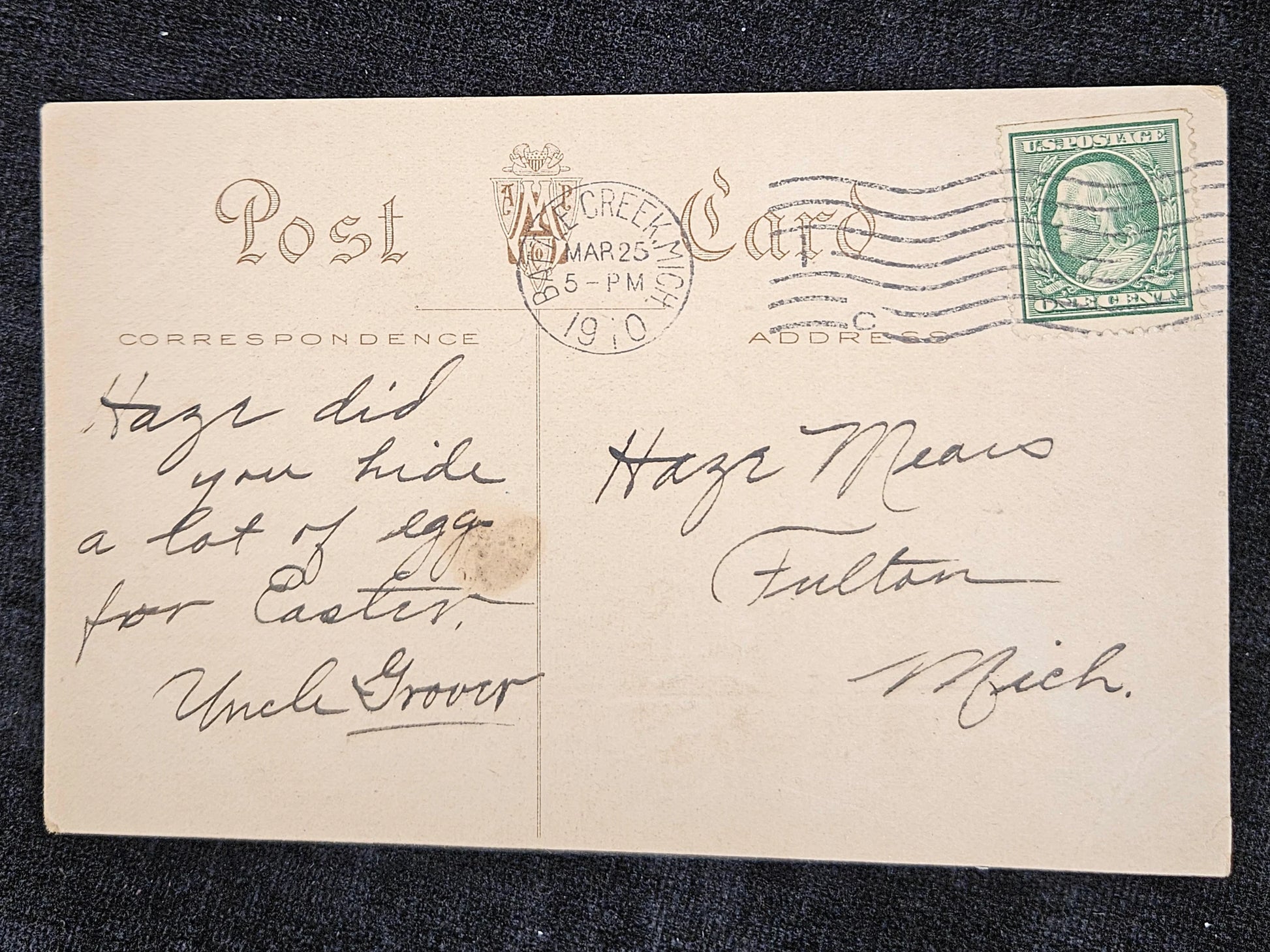 Vintage letter with postage stamp and postmarks on a dark background