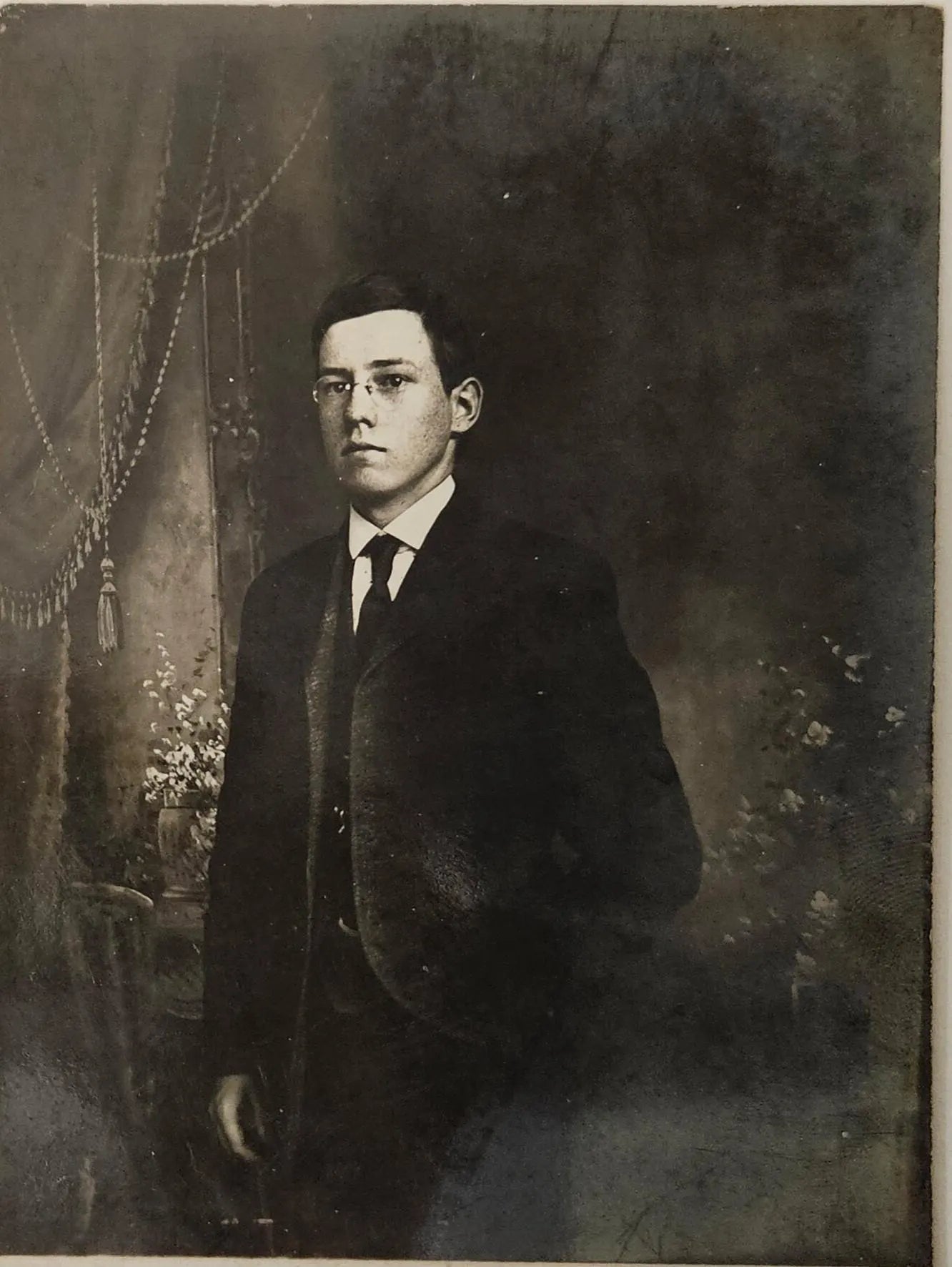 RPPC - Well Dressed Victorian Young Man- Graduation Photo - Victorian decor in backgroundge