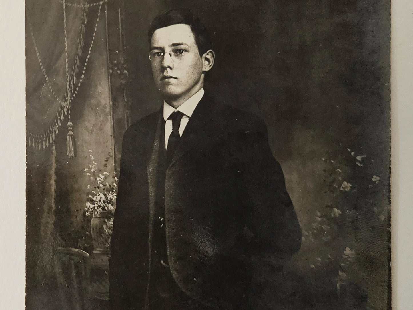 RPPC - Well Dressed Victorian Young Man- Graduation Photo - Victorian decor in backgroundge