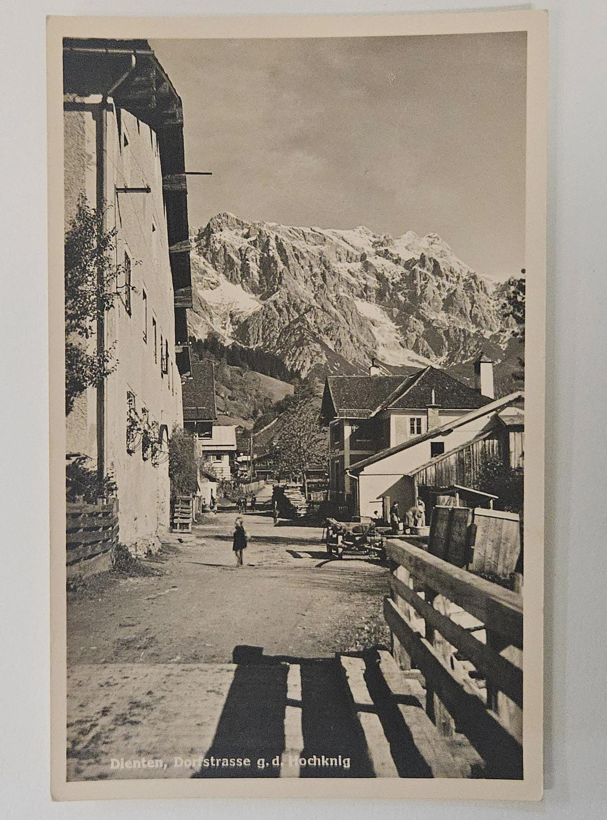 RPPC Dienten Hochknig Austria Dortstrasse, Little Girl in walking alone , Moutains ahead