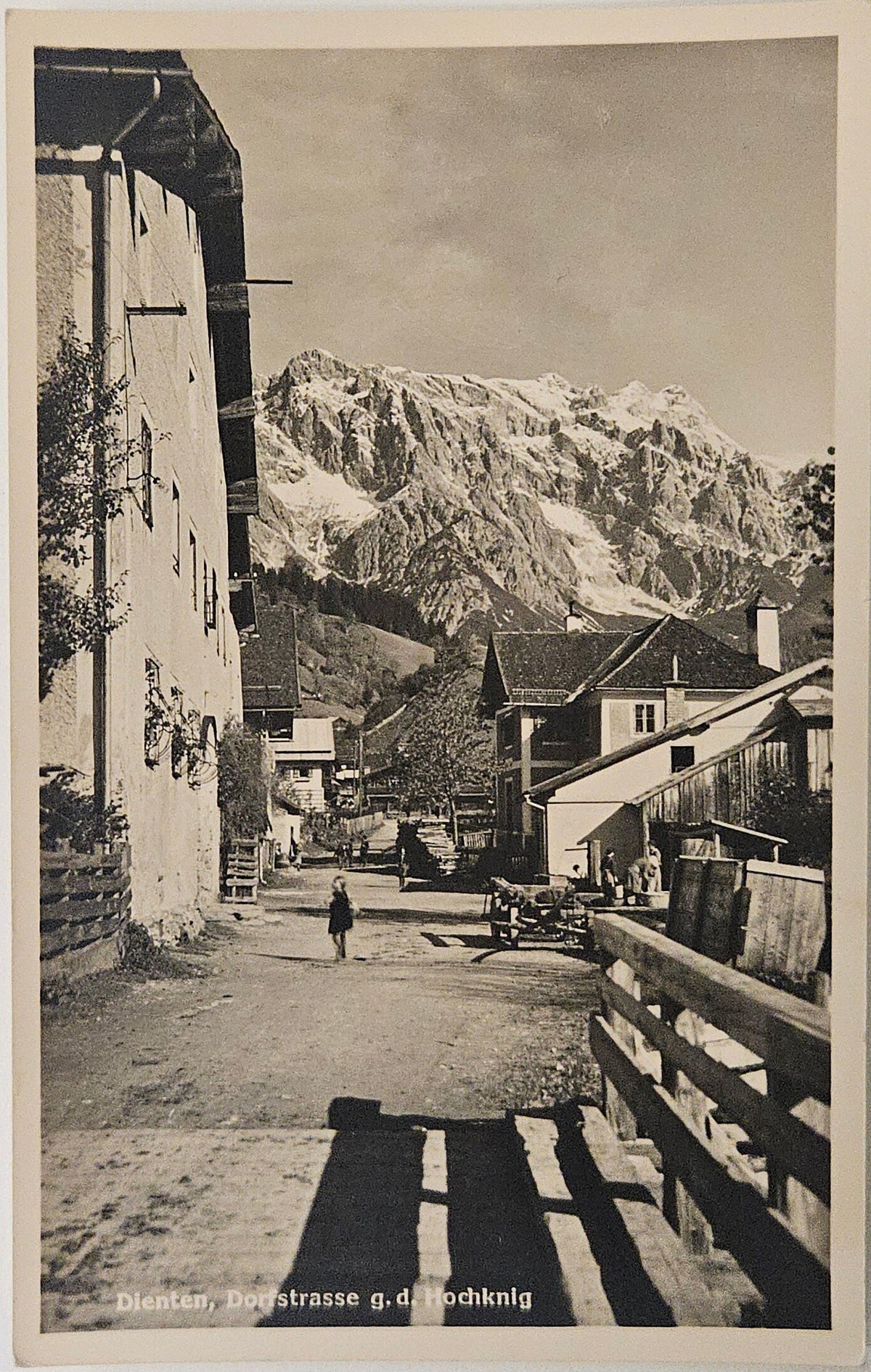 RPPC Dienten Hochknig Austria Dortstrasse, Little Girl in walking alone , Moutains ahead