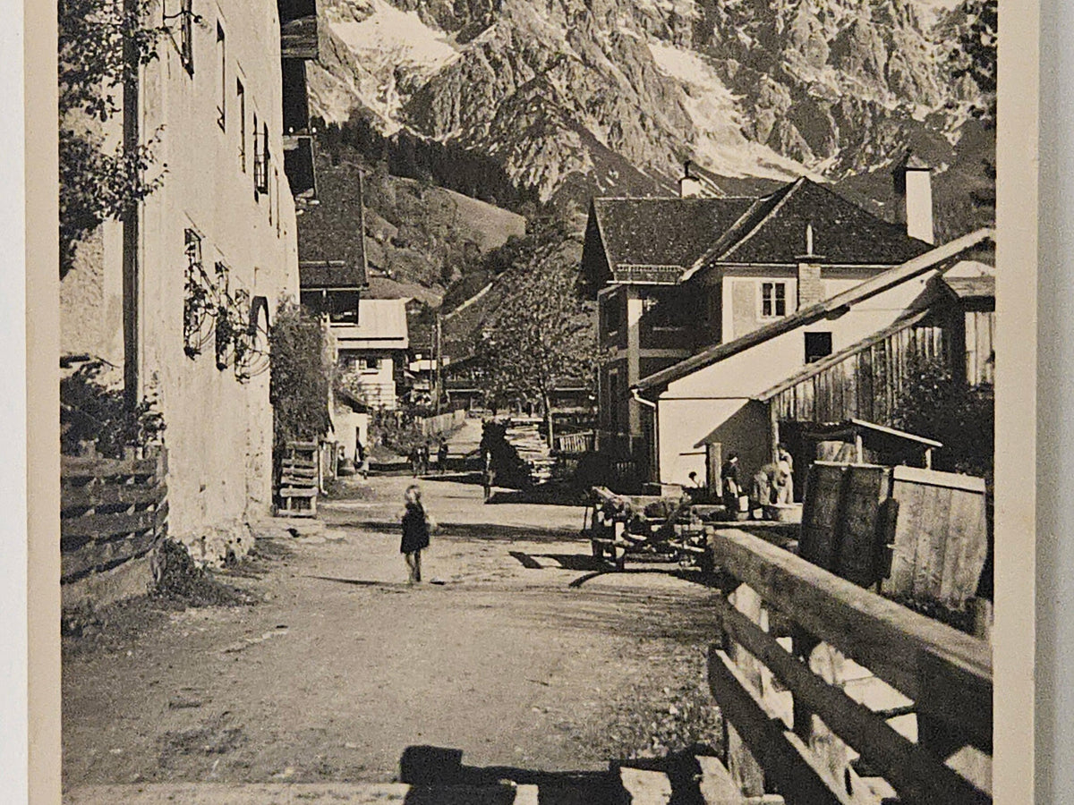RPPC Dienten Hochknig Austria Dortstrasse, Little Girl in walking alone , Moutains ahead