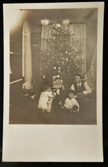 RPPC Christmas Father with 3 Children by Christmas Tree -1915 era Real Photo Christmas Postcard -Funny Action Photo of Family Holiday - RARE