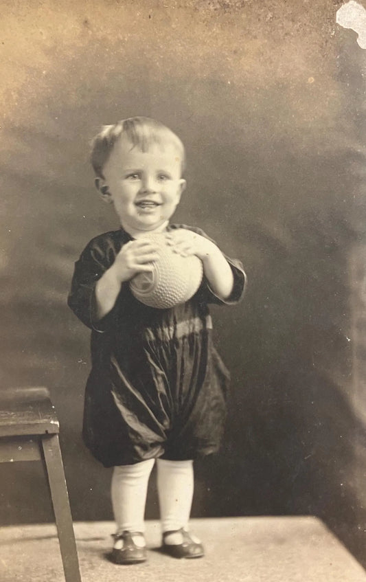 RPPC - Smiling Toddler Boy with a ball in 1910 - Vintage Real Photo Postcard - little boy with tiny feet
