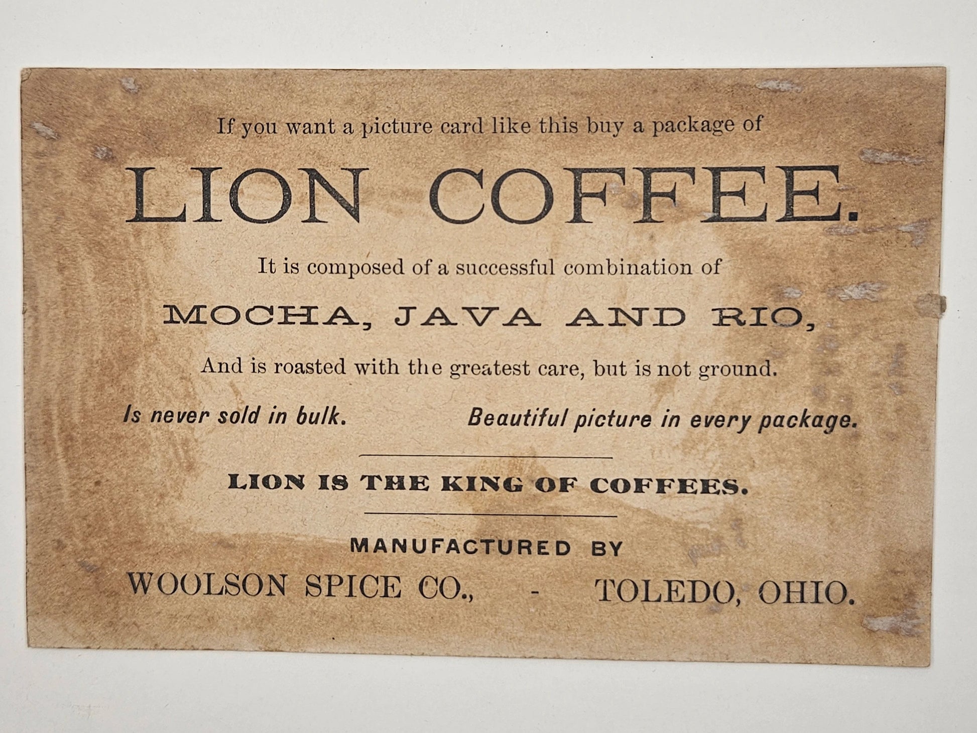 Vintage-style advertisement for Lion Coffee on a textured brown background