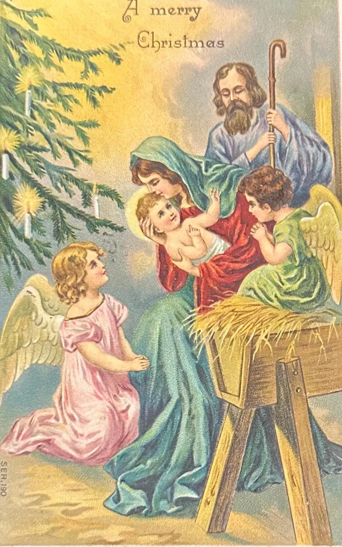 Vintage Christmas card with nativity scene and angels