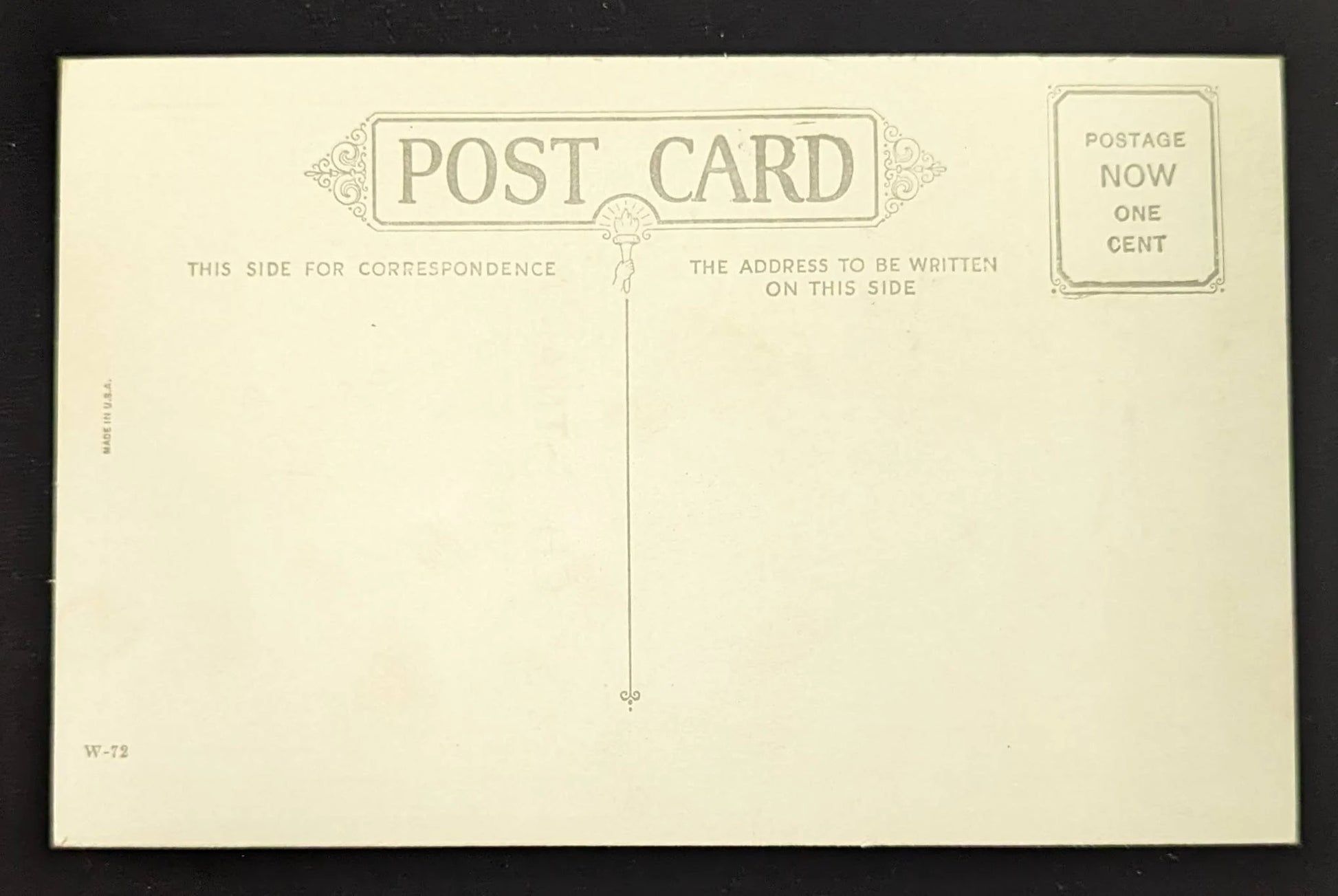 Vintage-style postcard with decorative text and design elements on a beige background.