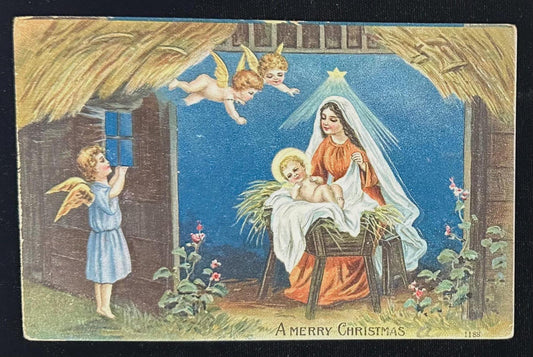 Vintage Christmas card with nativity scene, angels, and child holding a star.