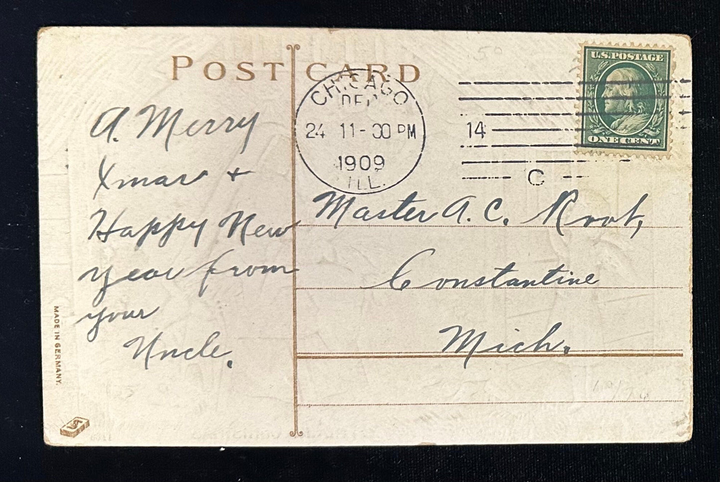 Vintage postcard with handwritten text and postage stamp, dated 1909.