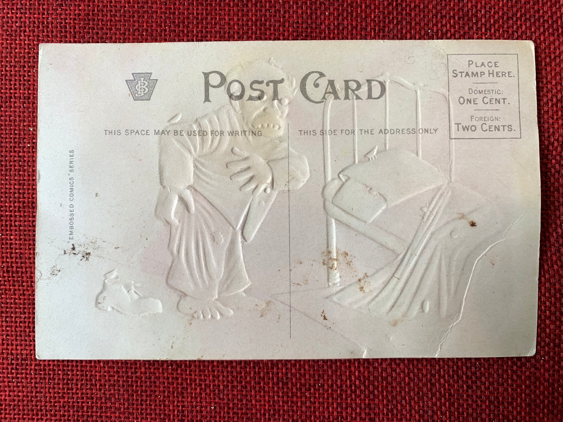 This postcard features an illustration of a man in pajama with bugs on him next to an unmade bed