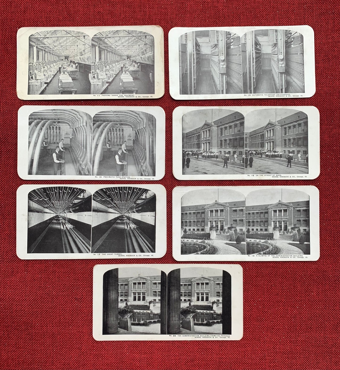 A collection of seven vintage stereo view cards depicting black and white images of the Sears, Roebuck & Co. headquarters in Chicago, Illinois, from the 1910s.