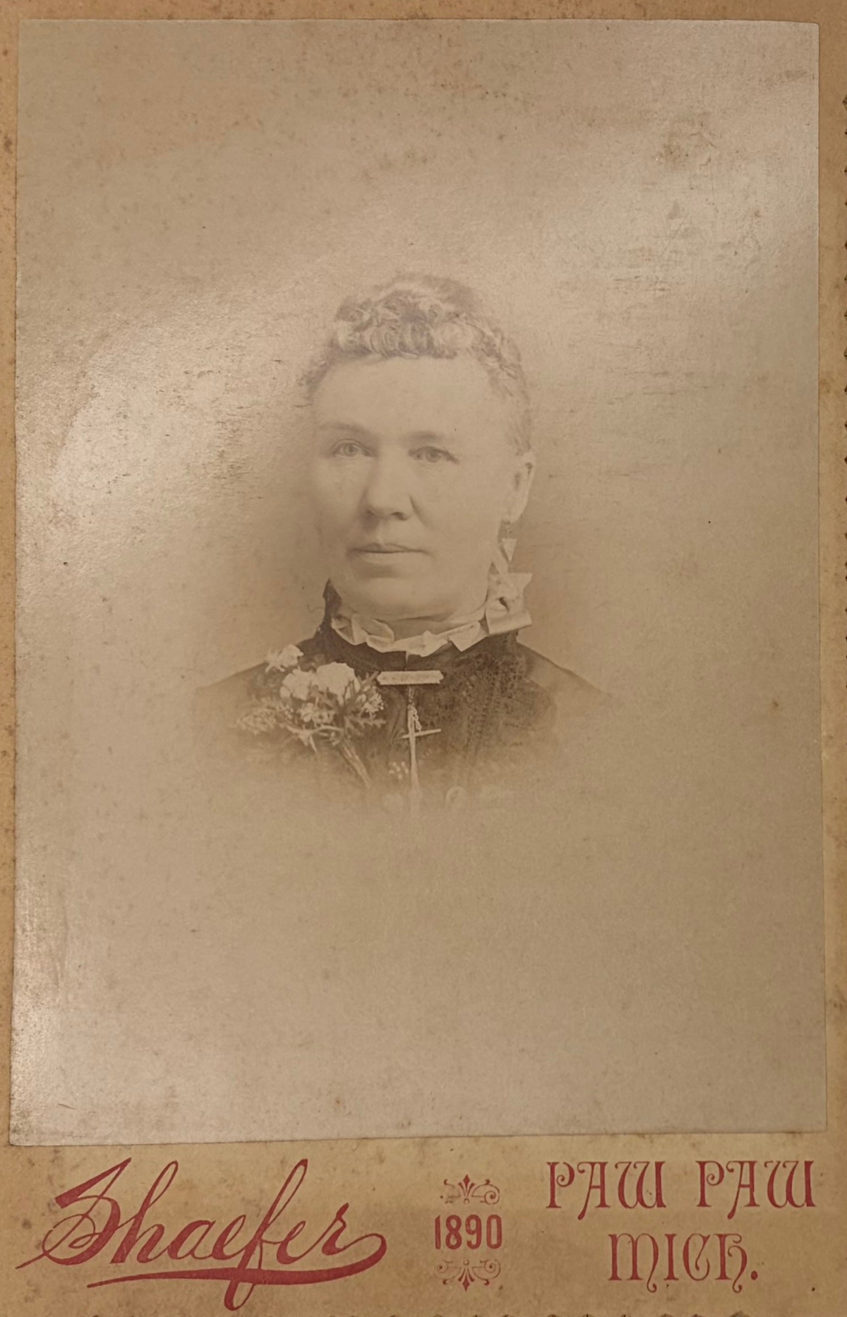 Vintage sepia-toned portrait photograph print with a decorative border and printed text at the bottom reading 'Shafers', '1890', and 'PAW PAW MICH.'.