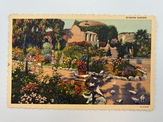 This linen postcard was printed in 1935 with a hand-colored view of the San Juan Capistrano gardens. The Mission Gardens are still open today.