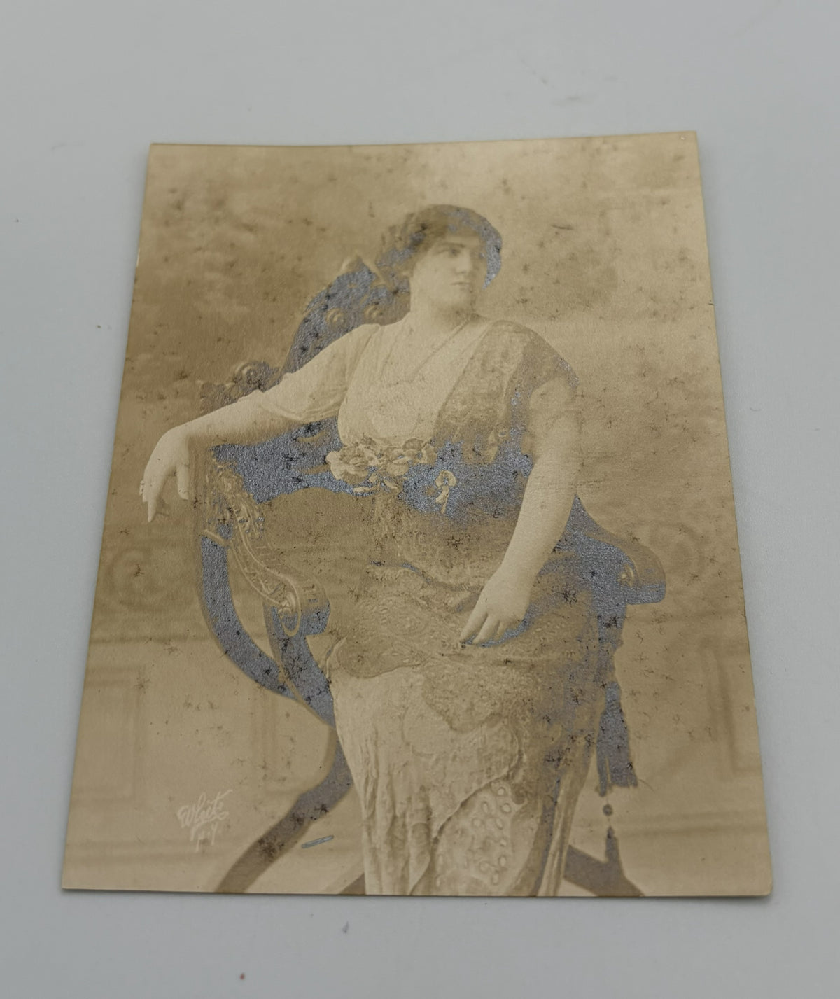 Photo of a Woman in Ornate Chair and Dress - Turn of century