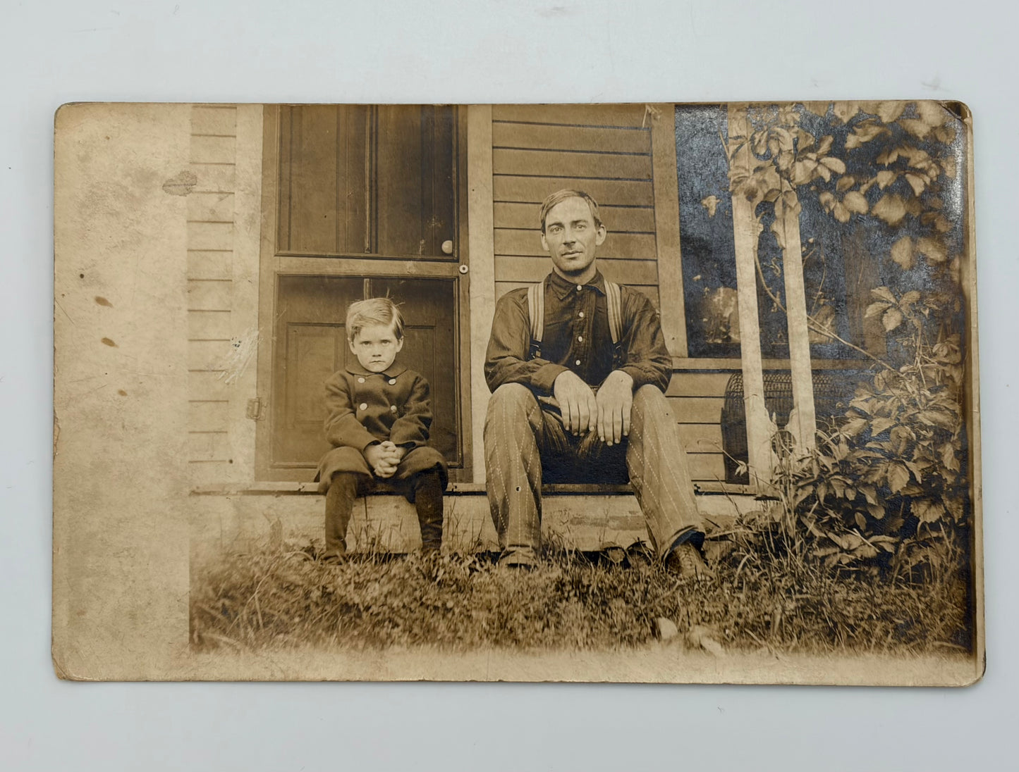 RPPC | Father and Son on Farmhouse Porch, c. 1910