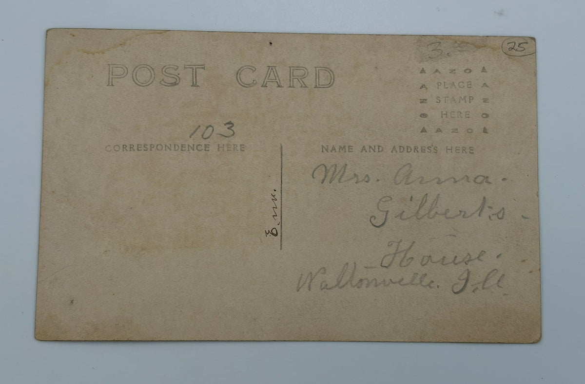 An antique vintage postcard showing the back side with handwritten address and printed text, displayed flat against a light gray background.