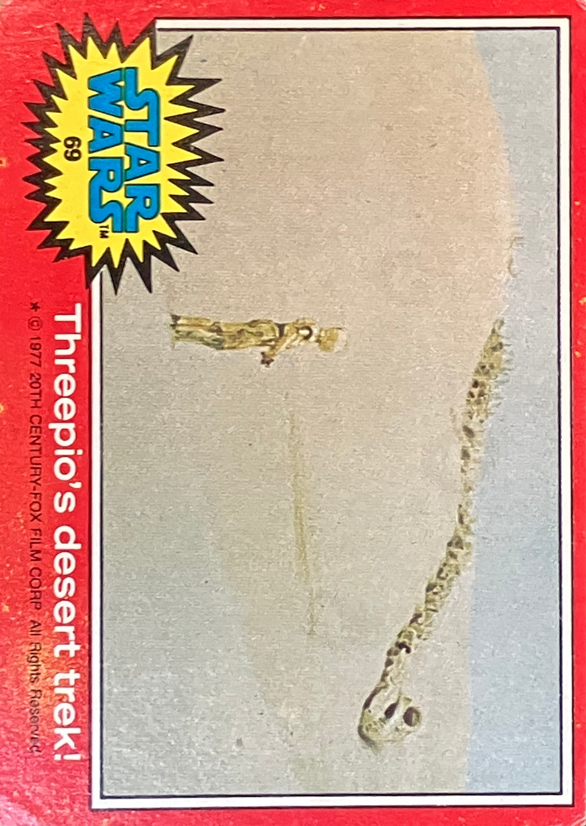 Vintage Star Wars trading card featuring a small figure on a desert landscape with a red border and 'Star Wars' logo.