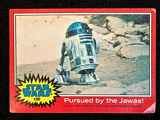 A vintage Star Wars trading card featuring R2-D2 on a rocky desert background, with a red border, yellow Star Wars logo, and the title 'Pursued by the Jawas!'.
