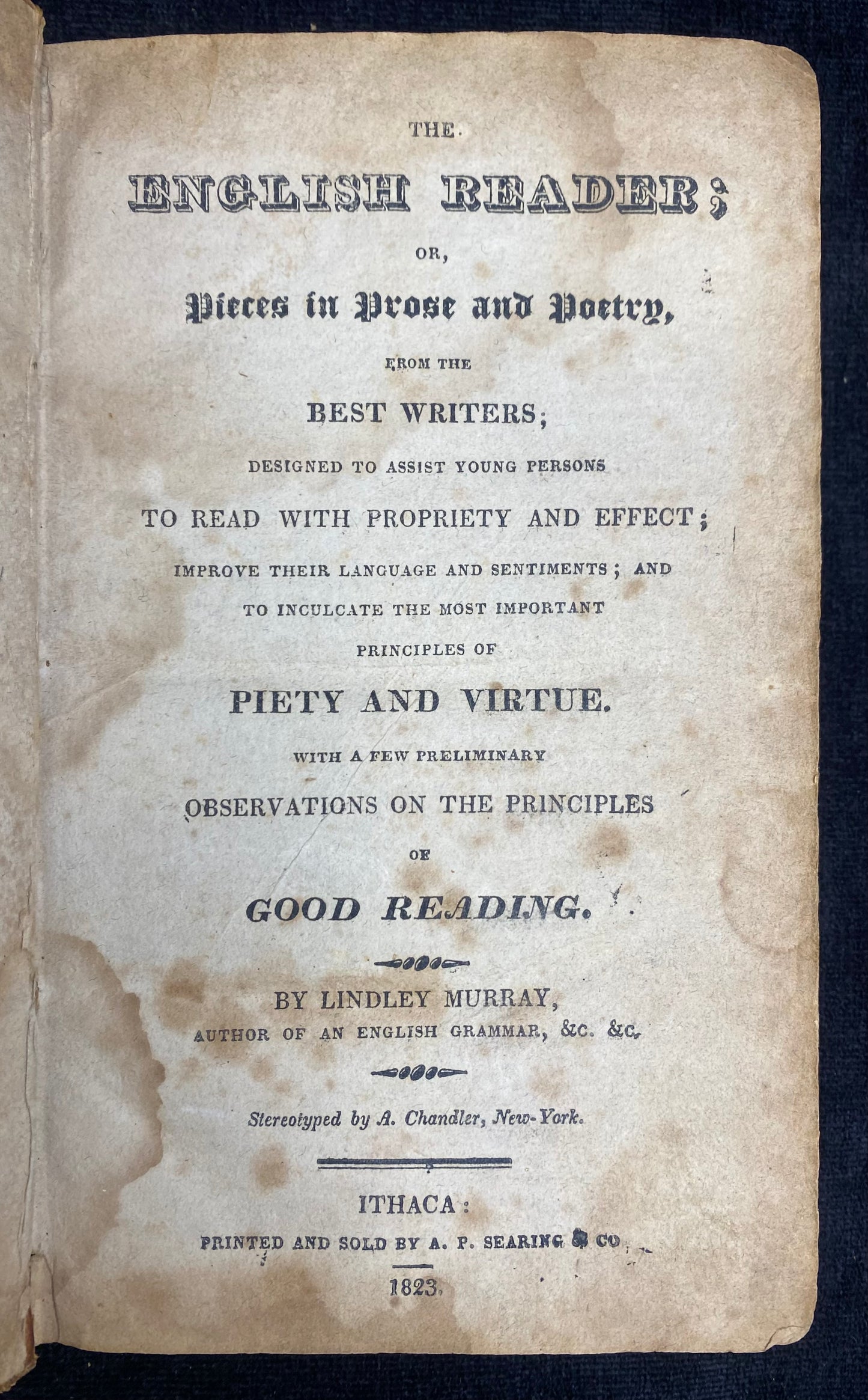 Title page of 'The English Reader' by Lindley Murray on a dark background