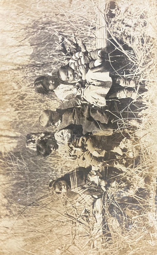 1920s RARE RPPC with American Indigenous Children Sitting with a Blond Child - Historic Michigan RPPC