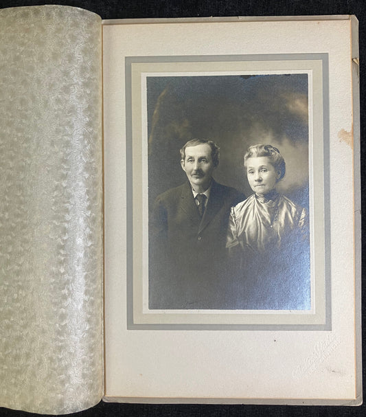 Middle Aged Couple in Studio Photo, late 1800s- Photo by H. Baker, Allegan, MichiganAnniversary Photography - Historic Michigan Photography