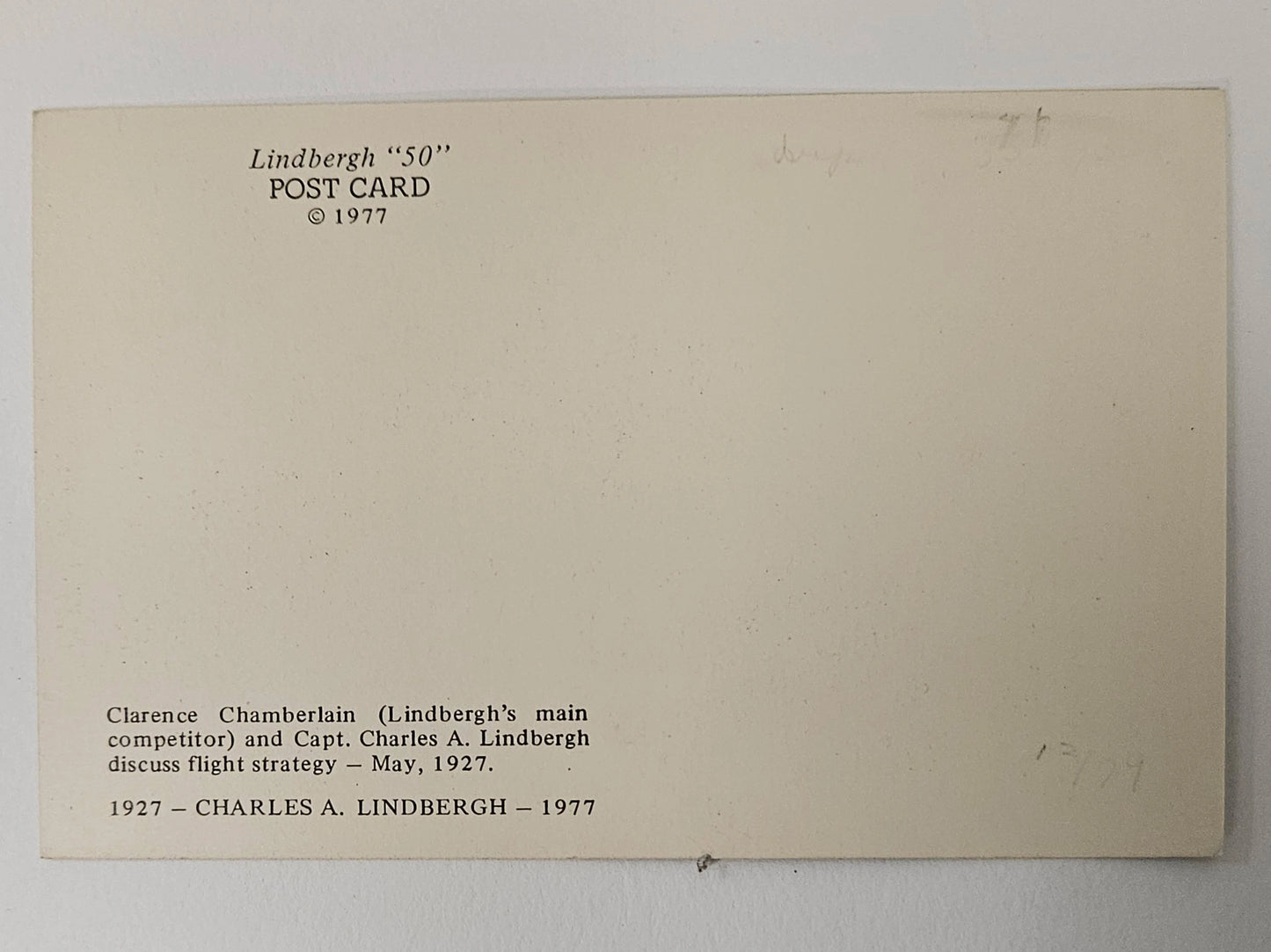 Back of a Lindbergh '50' postcard with text about Charles A. Lindbergh and Clarence Chamberlain.
